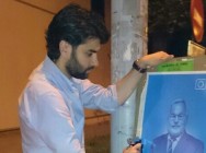 Luis Miguel Berandón, Secretario General, pegando carteles